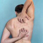 Young slim woman enjoys weight loss result